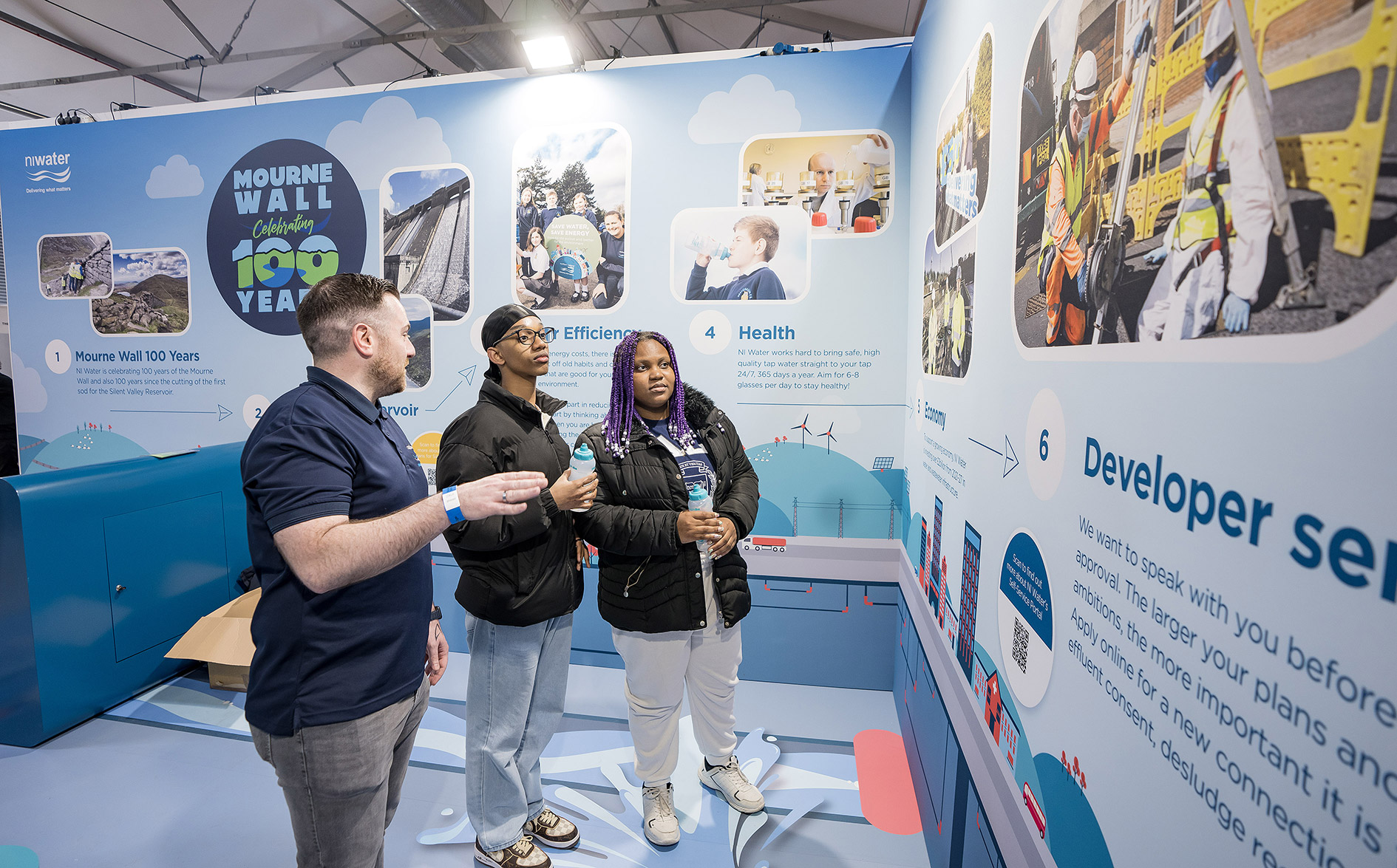 People looking at exhibit information