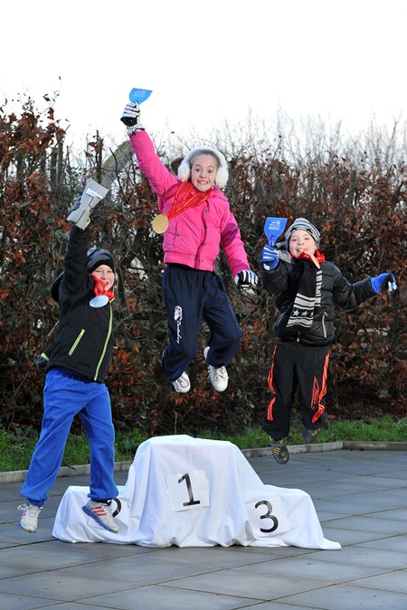 (l-r) John Parkes (9); Lauren McCullagh (10); and Conor McCullagh (8) as gold, silver and bronze Winter Champions on behalf of NI Water | NI Water News