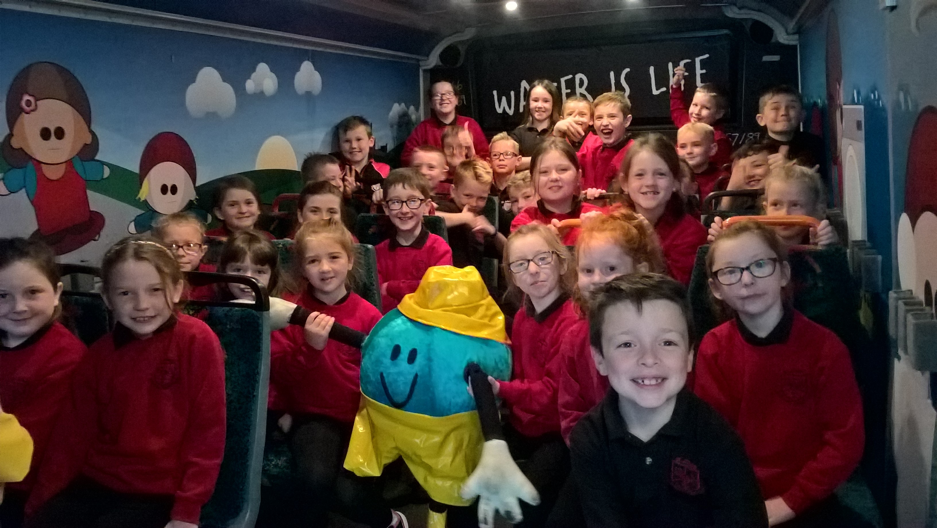 Boys and girls from St John’s Primary School, Kingsisland, Coalisland on the Water Bus. | NI Water News