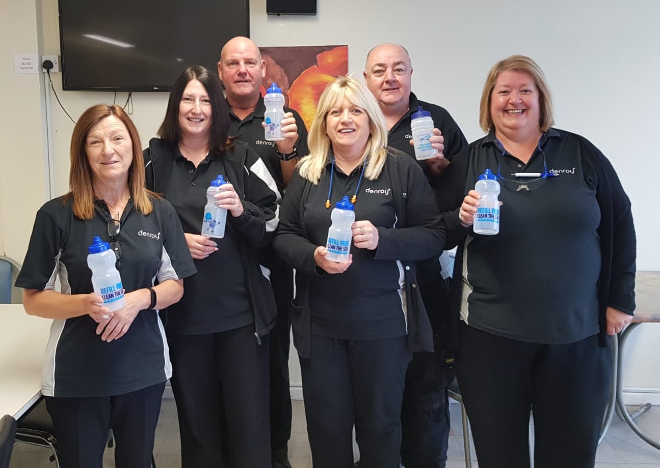 Over 100 employees at Denroy Bangor are supporting NI Water’s Refillution campaign with the aim of reducing single-use plastic bottles. Pictured are some members of the company with their reusable water bottles. | NI Water News