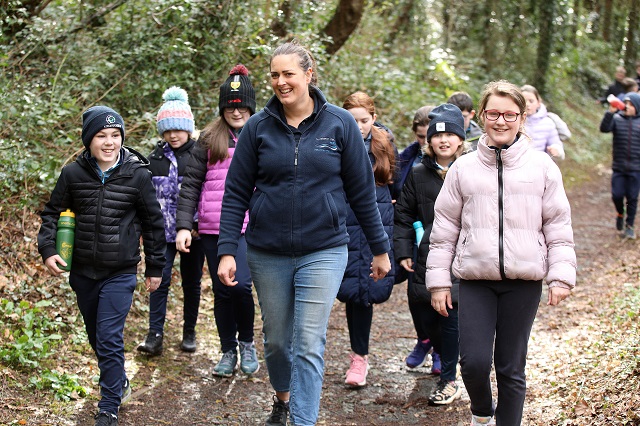 Photo of Anna Killen leading the Walk for Water with St. Paul’s Primary School