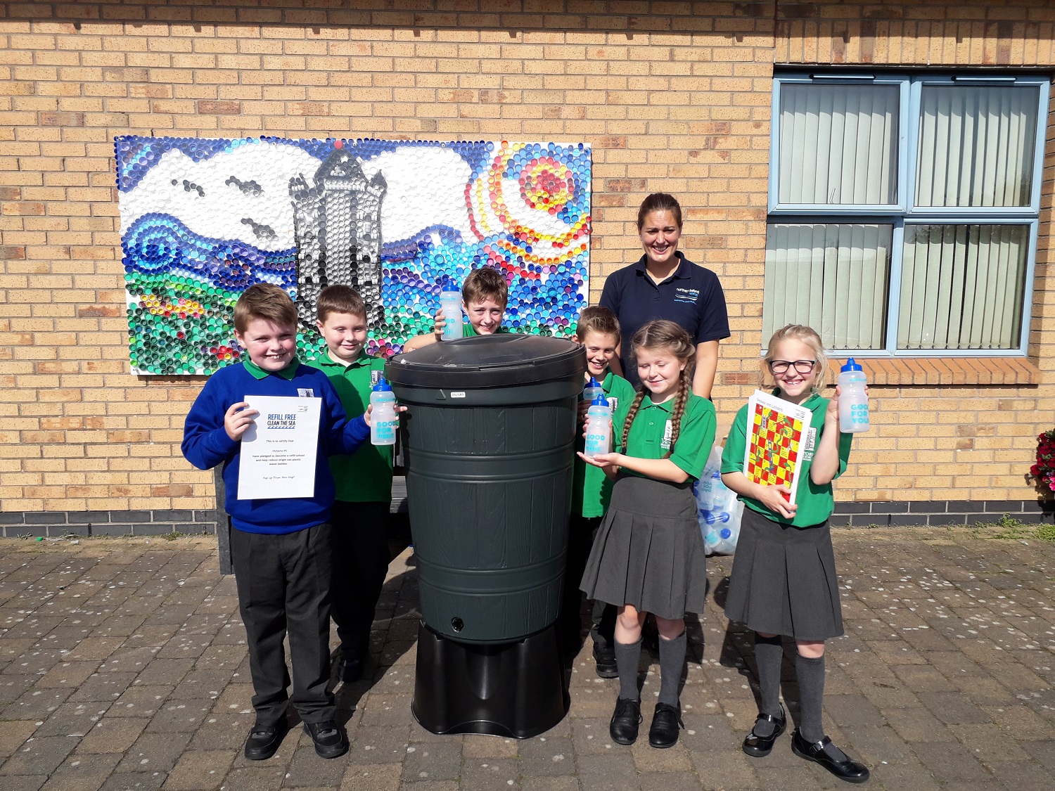 Pictured is NI Water Environmental Outreach and Learning Officer, Anna Killen, with pupils Victoria Primary School | NI Water News