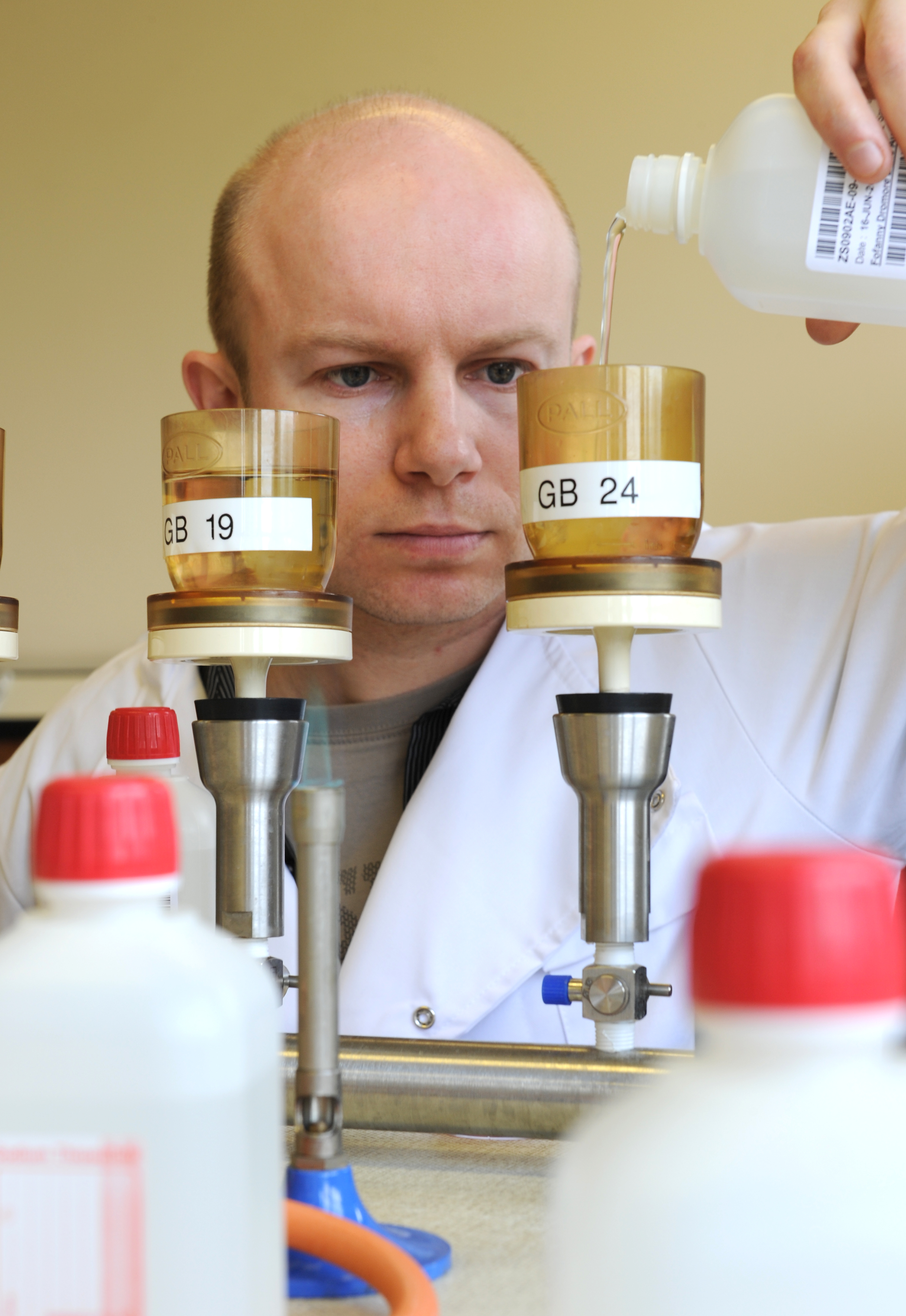 Staff member from sampling team testing a sample for quality