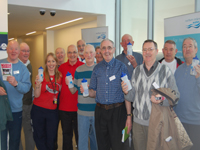 Pictured is Deirdre Murphy, Voluntary Service Bureau with members of Men Utd who came from North and West Belfast, enjoying a drink of water after their work outs! | NI Water News