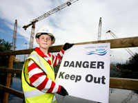 Caonhan Rodgers erects a 'Danger Keep Out' sign | NI Water News