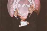 Pictured is RoSPAâ€™s vice present, Lord Brougham & Vaux (right) presenting the Silver award to NI Waterâ€™s Head of Health & Safety, Eddie McVeigh | NI Water News