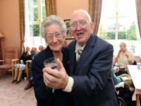 Pictured are Edgcumbe's own 'Bruce' and 'Tess', Pearl Robinson and Sam Anderson dancing the day away while enjoying a glass of water | NI Water News